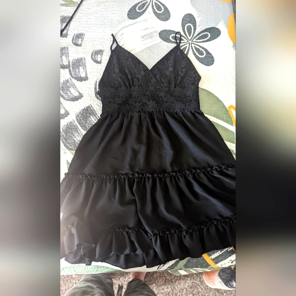 Black spaghetti strap dress with lace pattern